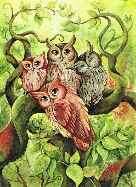 Three Owls Sitting On Top Of A Tree Branch
