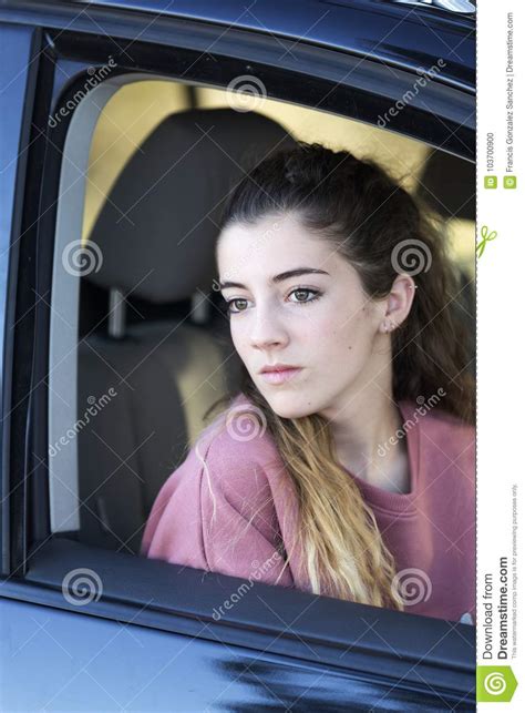 Teenage Girl Looking Out The Window Of Her Car Stock Photo Image Of