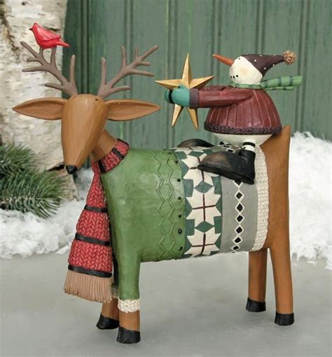 Snowman Sitting On A Deer Holding A Star Figurine Christmas Crafts
