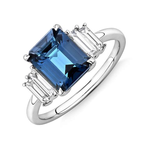 London Blue Topaz Ring With 030 Carat Tw Of Diamonds In 14kt White Gold