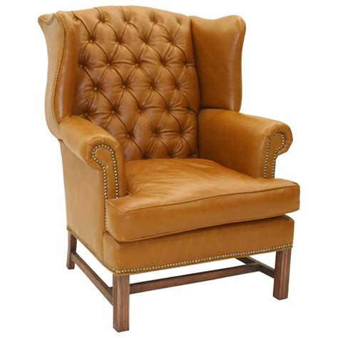 The swivel seat is padded with 2 of foam and covered with mesh upholstery. Vintage Brown Leather Wingback Armchair from Hickory ...