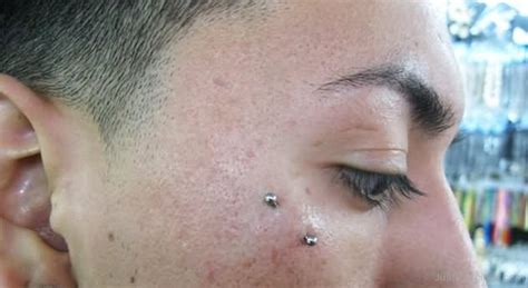 An anti eyebrow piercing is an unconventional kind of surface body piercing that often uses a small surface bar and is commonly placed just right above the cheekbone and below the lower orbit of the. Anti Eyebrow Piercings - Page 8