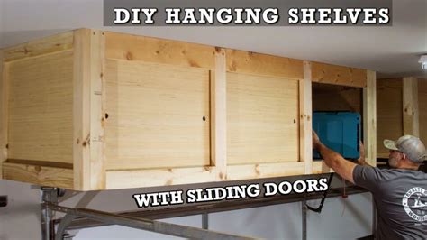 The building plans and tutorial are very detailed as well. DIY Hanging Storage Shelves With Sliding Doors - Overhead ...