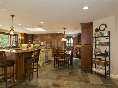 Old stone kitchen flooring, stone can last for a very long time. Kitchen Floor Buying Guide | HGTV