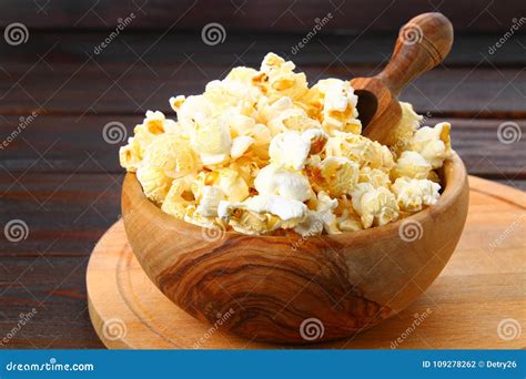 Salted Popcorn In A Wooden Bowl On A Wooden Table Stock Photo Image
