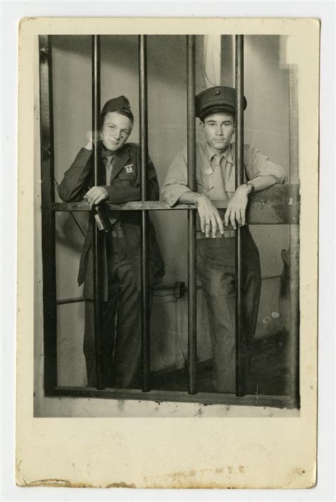 Photograph Of Two Boys Posing Inside A Jail Cell The Portal To