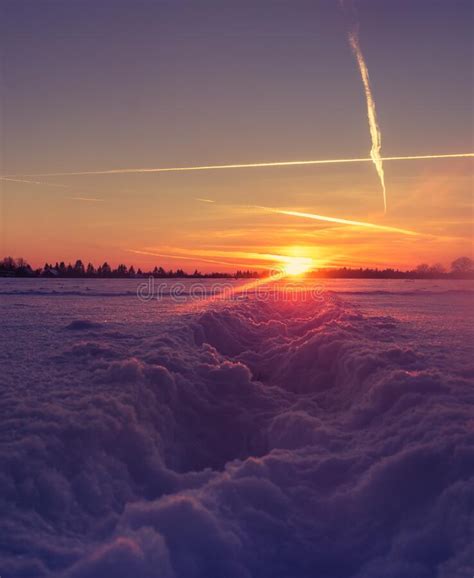 A Beautiful Winter Morning Landscapes With Human Feet Tracks Through