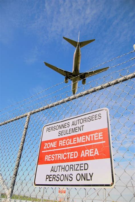 Passenger Jet And Airport Perimeter Fence Stock Image Image 3736687