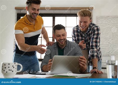 Happy Friends Working Together In Modern Office Stock Image Image Of