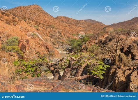 Landscape View Of The Kunene River The Border River Between Namibia