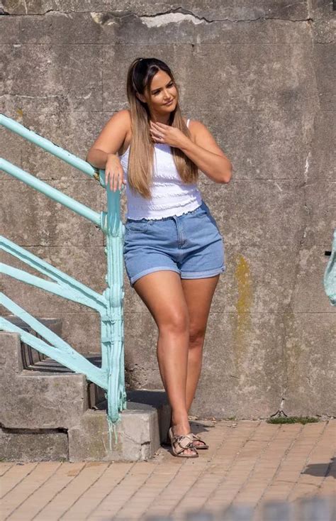 Jacqueline Jossa Flaunts Incredible Figure In Denim Shorts As She Confidently Poses For