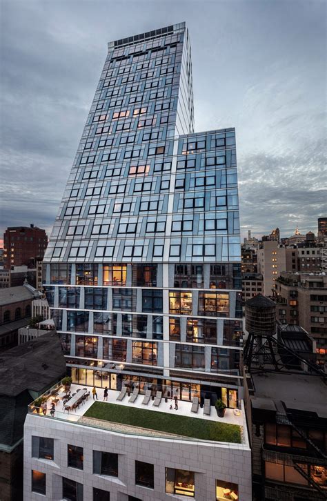 Giant Slanted Glass Wall Defines New York City Apartment Tower By