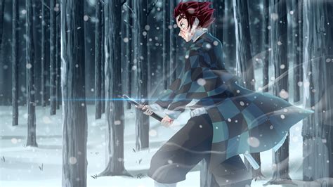 Demon Slayer Tanjiro Kamado With Sword On Snow Covered Forest With