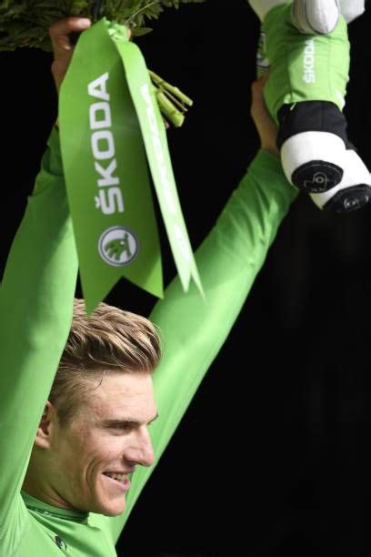 germany s marcel kittel celebrates his green jersey of best sprinter on the podium at the end of