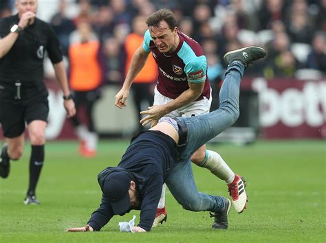 West Ham Issue Lifetime Bans To Fans Who Invaded Pitch And Threw Coins Against Burnley The