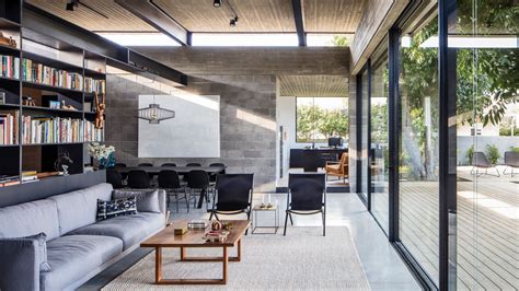 Give us a call to explore changes. Concrete house offers indoor-outdoor living among fruit ...