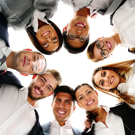 Group Of Business People In A Circle Looking Down Royalty Free Stock