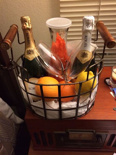 See more ideas about christmas, champagne color, christmas decorations. Champagne gift basket we made | Champagne gift baskets ...