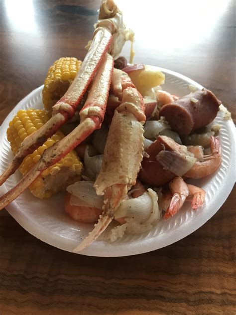 The clams were just scrubbed and thrown on. Homemade Low Country Boil topped with Crab Legs Red ...