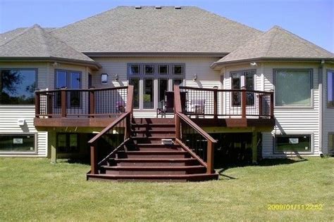 Deck installation, deck construction, deck replacement Trex Deck with Flared Stairs in Lake Geneva built by Rock ...