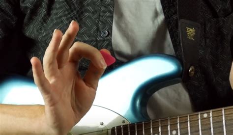 How To Hold A Guitar Pick Guitar Picking Exercises Guitar Tricks Blog