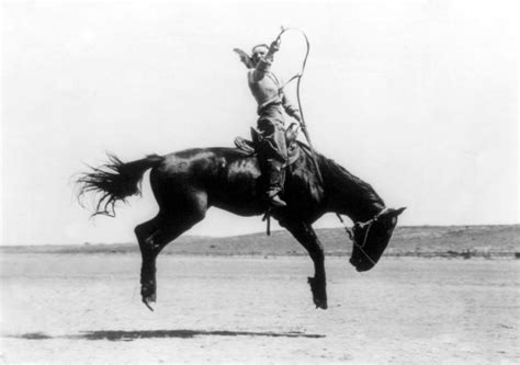 Cowgirl Riding Bucking Bronco 1919 Photograph By Science Source