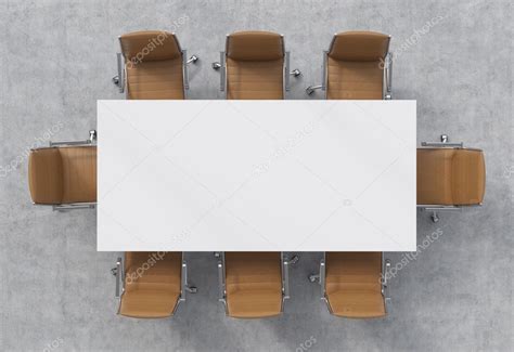 Top View Of A Conference Room A White Rectangular Table And Eight