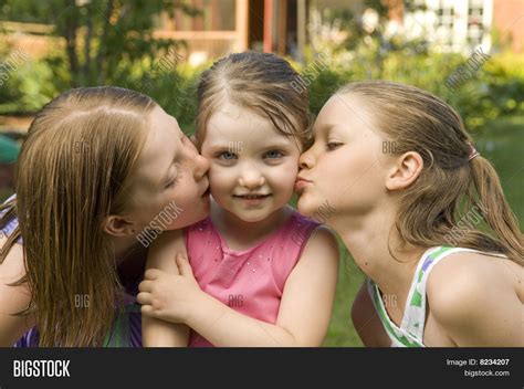 Three Cute Girls Kissing Image And Photo Bigstock