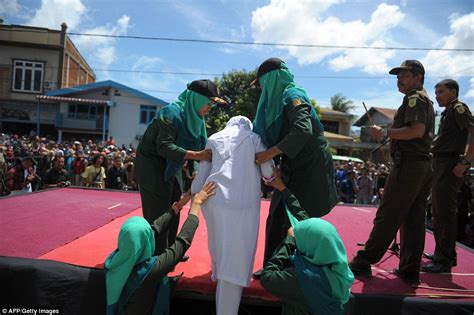 unmarried couples are flogged for violating sharia law in indonesia daily mail online