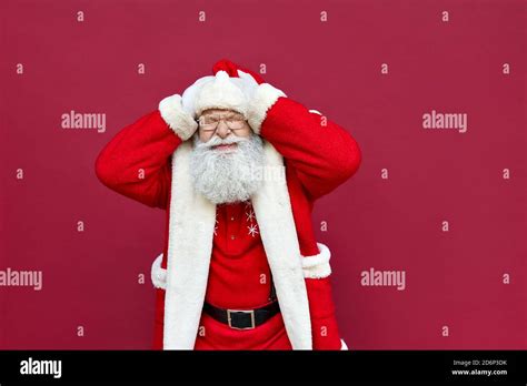Santa Claus Feeling Headache Or Stress About Mistake On Red Background