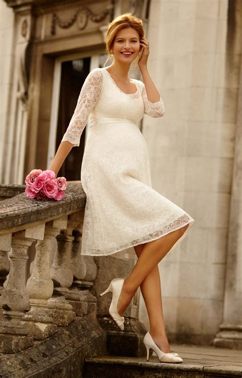 make a streamlined entrance wearing our stylish freya short lace maternity wedding dress