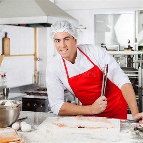 Smiling Chef Sprinkling Flour On Ravioli Pasta Stock Image Image Of
