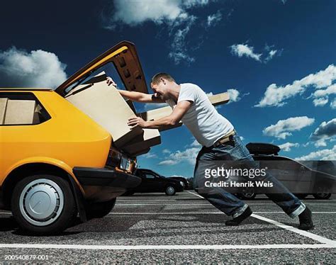 Man Pushing A Car Photos And Premium High Res Pictures Getty Images
