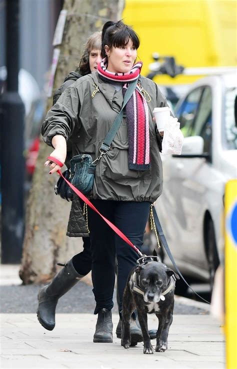 I gave it all up in september 2009 when i realised that spending every minute of the day knitting was lot more fun and a. Anna Richardson in an Olive Windbreaker Walks Her Dog in ...