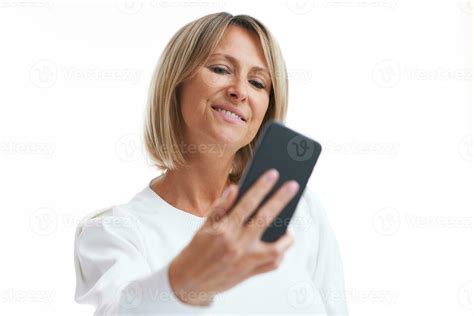 Picture Of Blonde Woman Over Back Isolated Background With Mobile Phone