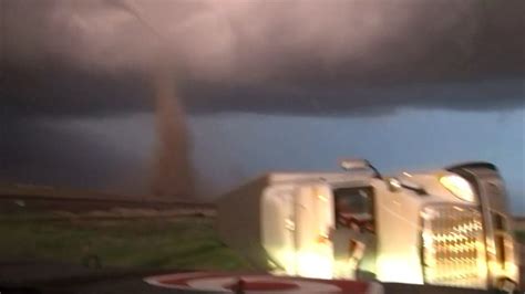 Watch Tornado Knocks Over Semi Truck Val Works To Help Driver