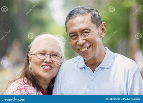 Asian Old Couple Smiling At The Camera Stock Photo Image Of Leisure