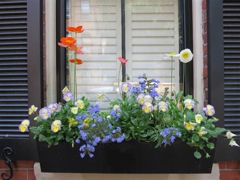 Stunning balcony filled with flower boxes and flowerpots creating a miniature garden in full bloom on a small white balcony. 20 Wonderfull Window and Balcony Flower Box Ideas That You ...