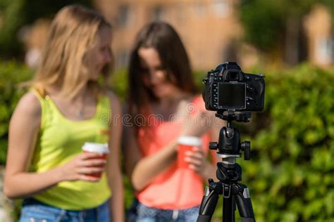 Two Girlfriends Girl Bloggers Summer Nature Writes The Video To The Camera Free Space For