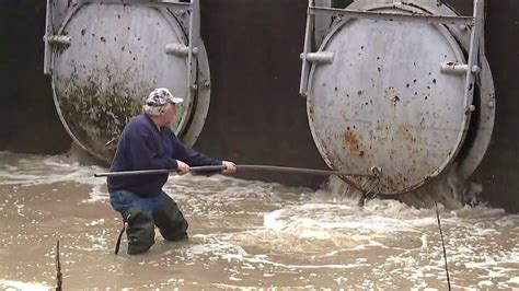 Workers Checking Flood Gates Drains In Lycoming County