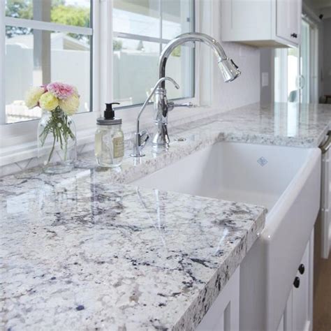 Most slabs also include sparkling quartz deposits giving it a great shine and luxurious appearance. White Ice Granite at Direct Prices - Di Pietra Design