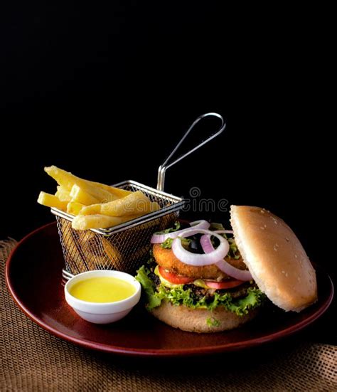 Double Bbq Beef Burger With French Fries And Dip Sauce Stock Image