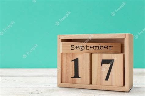 Premium Photo Wooden Cube Shape Calendar For September 17 On Wooden