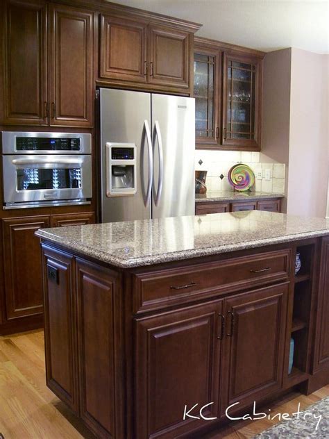Spice rack inside kitchen cupboard organiser stainless steel chrome. Highlands Ranch remodel. Maple cabinets with Cambria ...