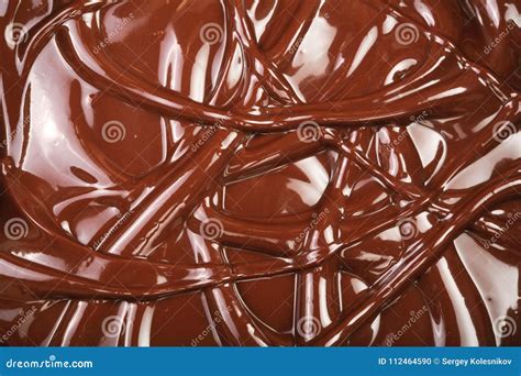 turbinio fuso del cioccolato come primo piano del fondo fotografia stock immagine di versarsi