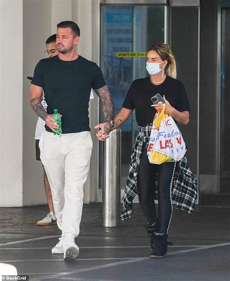 Katie Price Indulges In A Pizza With Her Fiancé Carl Woods As They