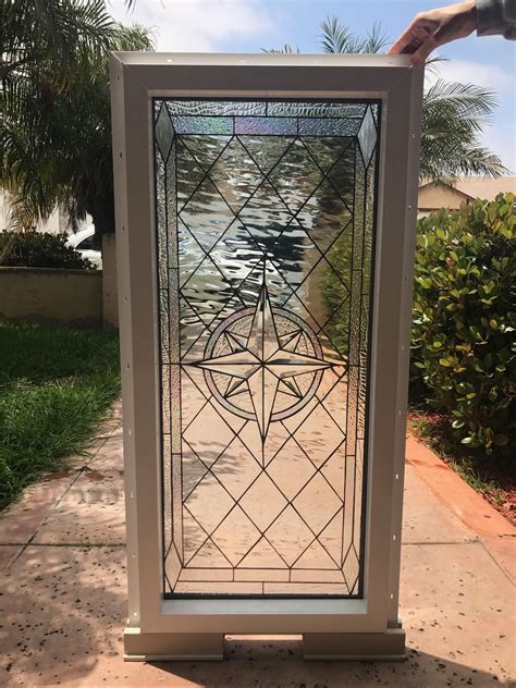 vinyl framed and insulated the maywood” leaded stained glass and beveled window