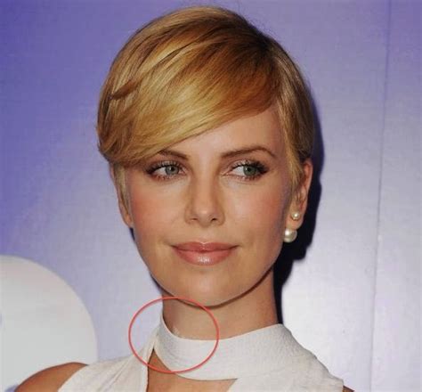Charlize Theron Hides Bandages On Red Carpet After Neck Surgery Short