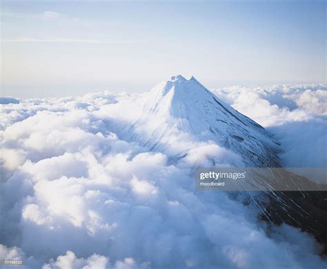Mountain Peak Above Clouds High Res Stock Photo Getty Images