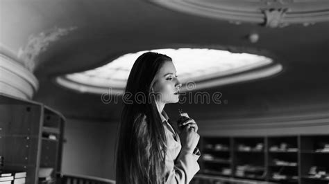 Portrait Of Beautiful Student Girl In The Library Black And White